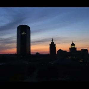 Somber cityscape of Lexington, Kentucky reflecting community mourning