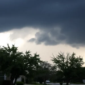 Dramatic severe weather scene in Fayette County with storm clouds and rain