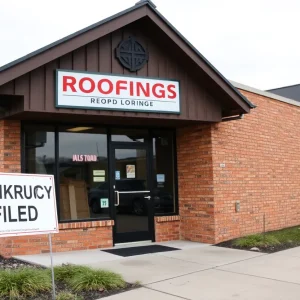 Front of a roofing company office with a bankruptcy notice in Lexington, Kentucky.
