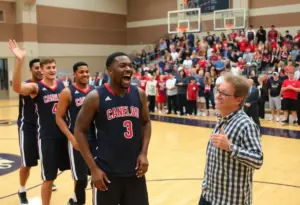 Adam Sandler visiting UK basketball teams during practice