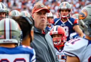 Coach facing challenges on the football field