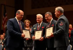 Governor presenting awards to citizens for their courageous actions in saving a police trooper's life.