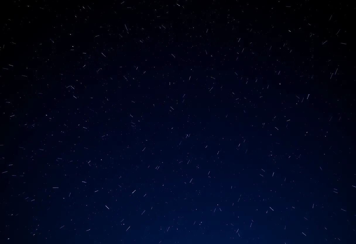 Night sky during the Geminid meteor shower with shooting stars