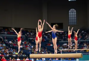 Gymnasts performing at the Kentucky gymnastics Blue-White Meet