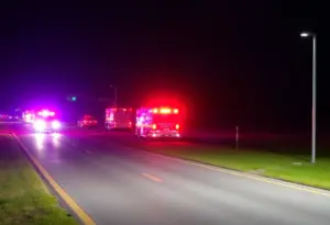 Emergency services responding to a crash on Liberty Road in Lexington, Kentucky
