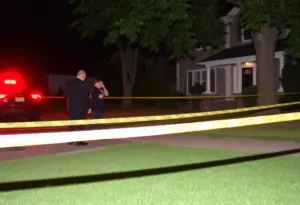 Police investigating a crime scene in Lafayette